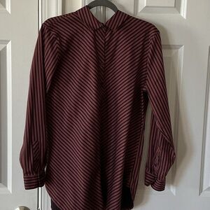 This Chicos size 2 top in a brown and black stripe is very versatile.